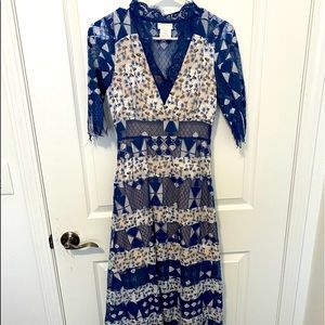 To the elbow sleeve blue lace foxiedox dress